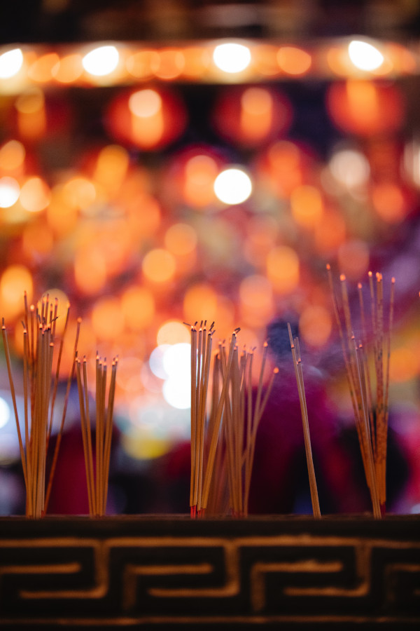 Bunch of incense in censer in Chinese temple