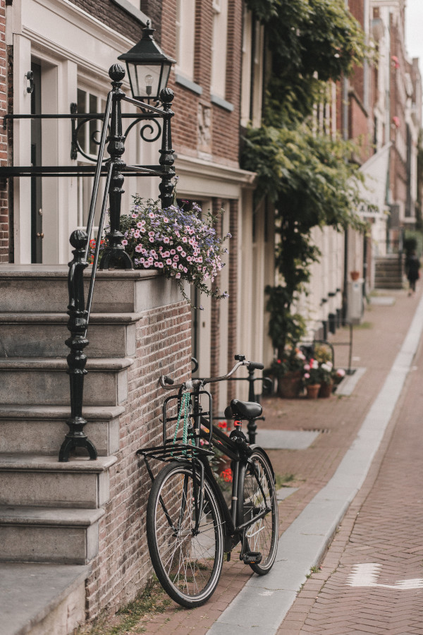 A bycicle parked at front step in the Netherlands